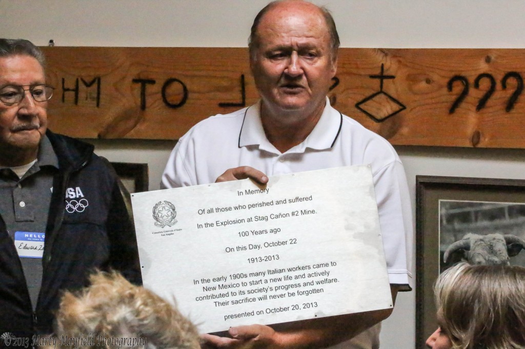 Joe Bacca holds the plaque presented to the Dawson New Mexico Association Sunday morning at the Raton Museum. 