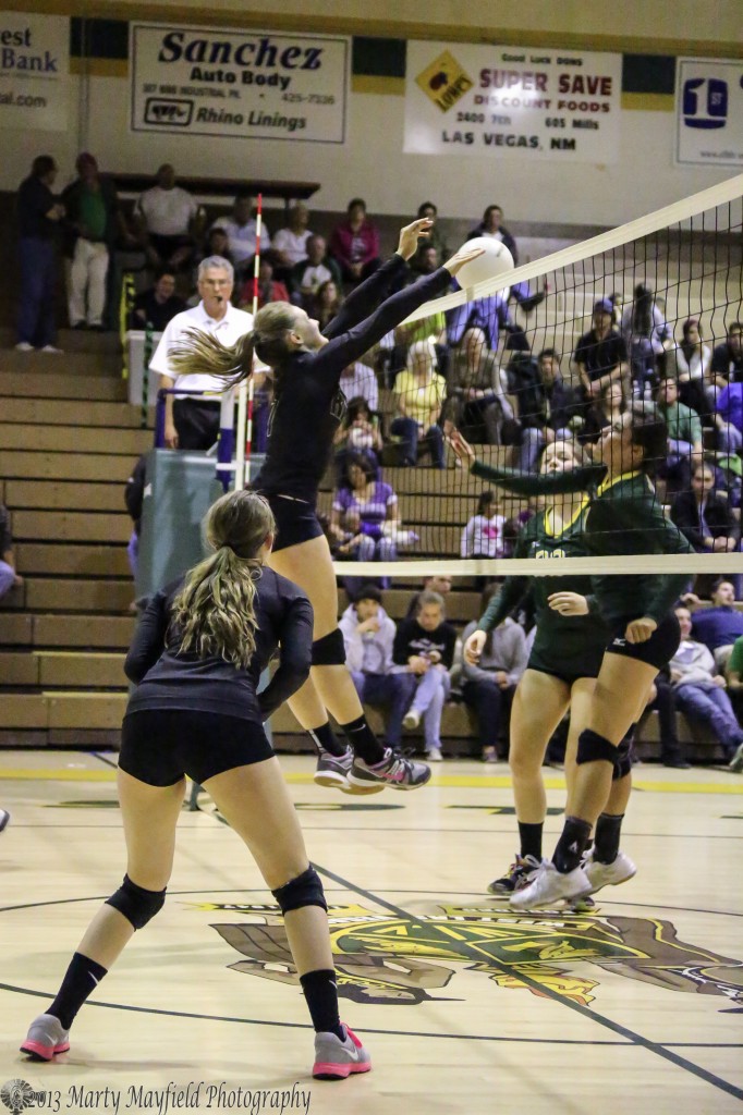 Mikala Vertovec gets this back over the net for the point during the district march in West Las Vegas