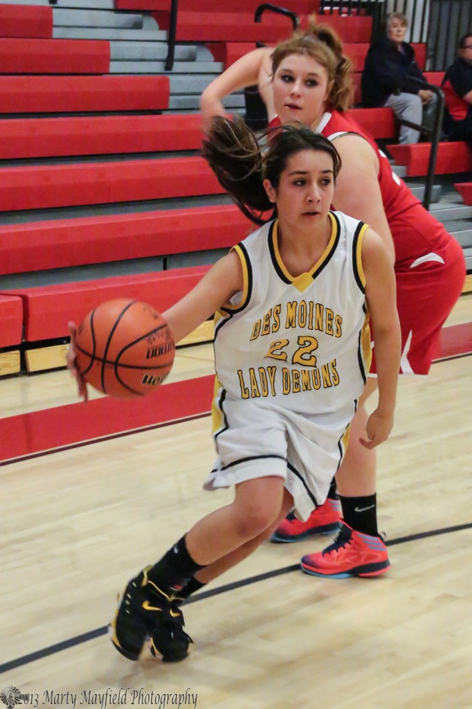 Alexis Wingo heads along the baseline toward the basket Wednesday night during the 77th Annual Cowbell