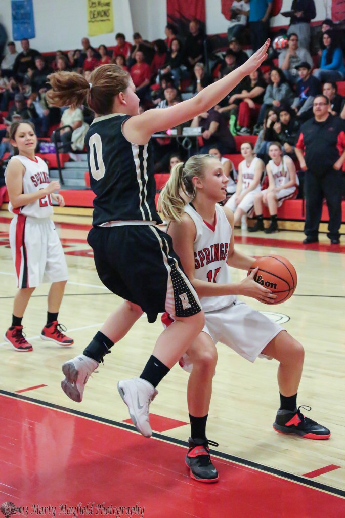 Danielle Blake pauses as Tate Wood goes up to make a block during the Cowbell Tourney Wednesday night.