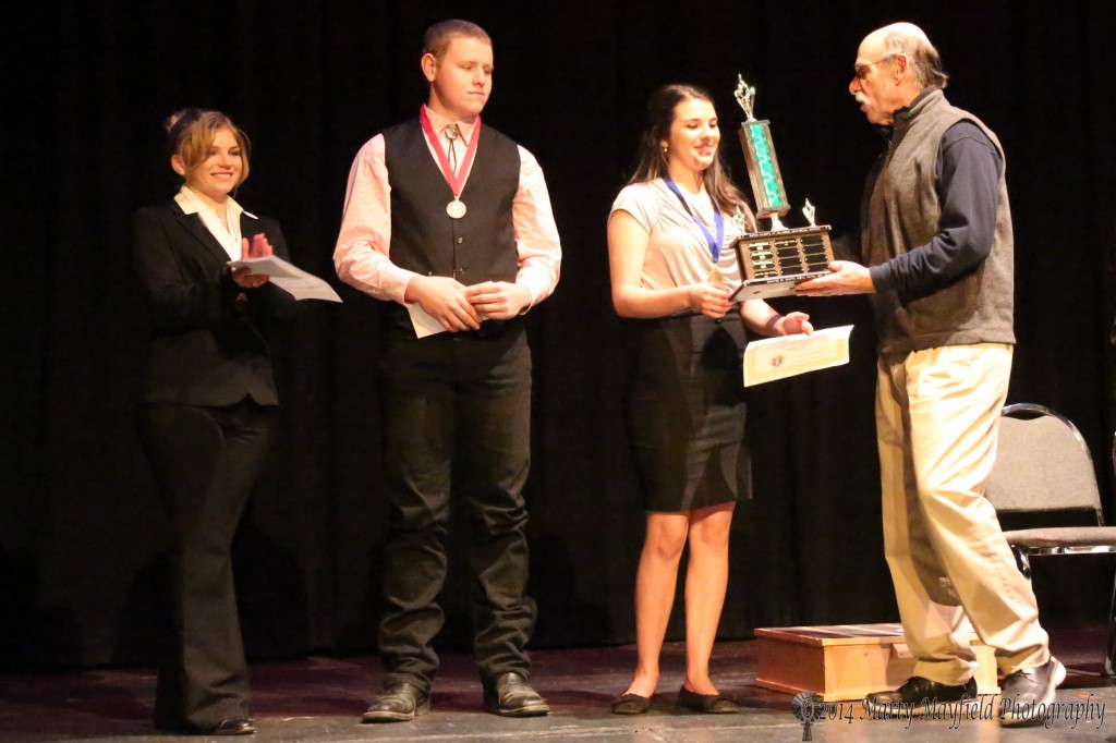 The Traveling Trophy for the Knights of Columbus Oratorical Contest once again goes to Maxwell High School who placed the top two winners this year. The Trophy was presented to Rebecca Galli by Randy Ruben.