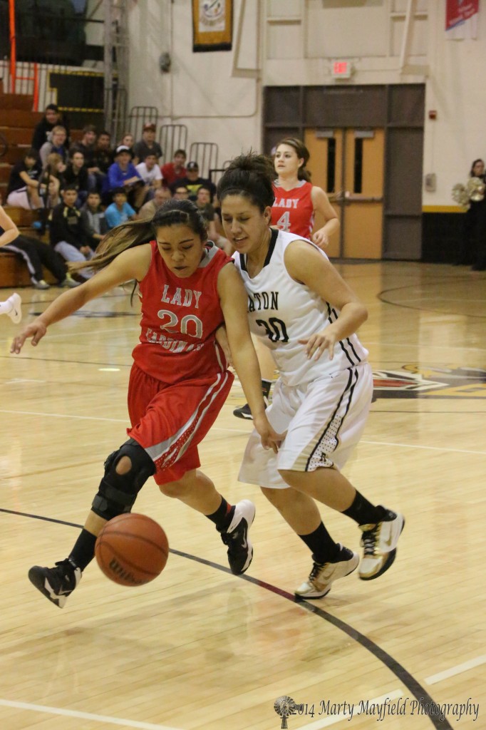 Robertson played a fast paced and aggressive game Thursday night against Raton, Chantel Sena gets in front of Michelle Guara and steals the ball.