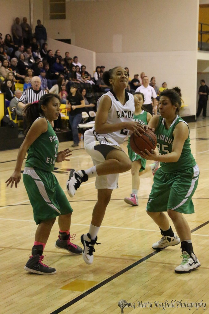 Elkette Gabby Gonzales makes the grab away from Mariah Romero as she was headed for the basket.