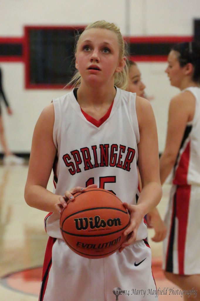 Danielle Blake concentrates on the goal as she prepares to put up on of her seven attempts on the nigh from the free throw line. Danielle only made three of those shots.