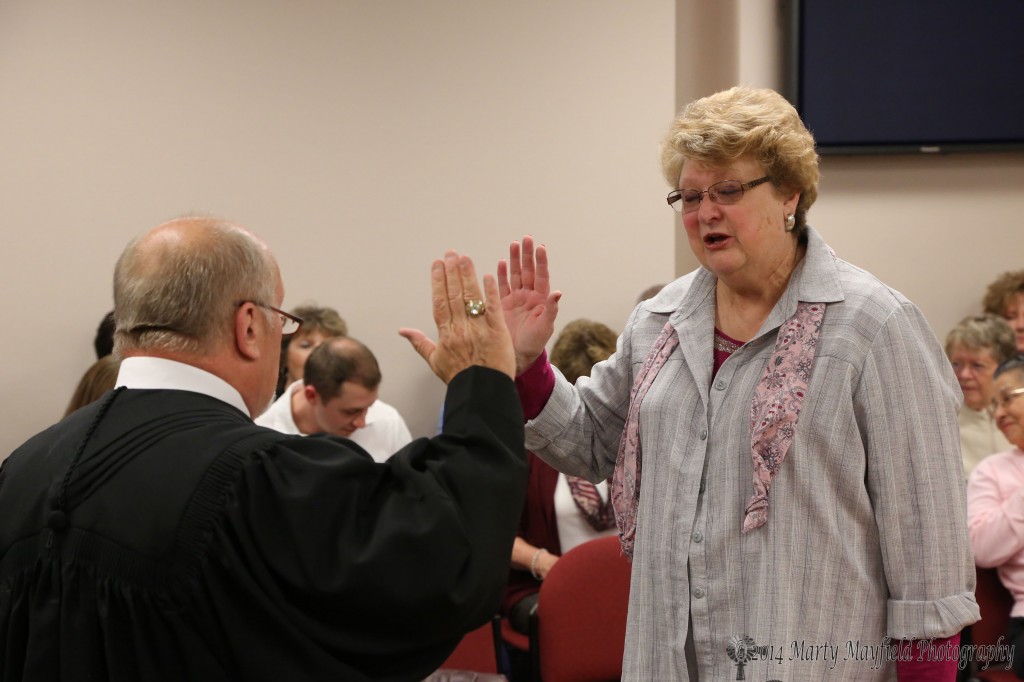 Commissioner Sandra Mantz is sworn in by District Judge John Paternoster