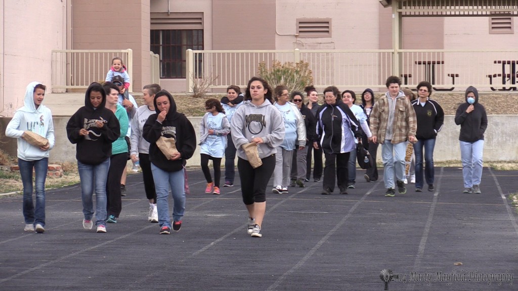 Raton High students, parents and friends braved the winds Saturday evening for a couple of hours to bring awareness of Autism to the forefront. 
