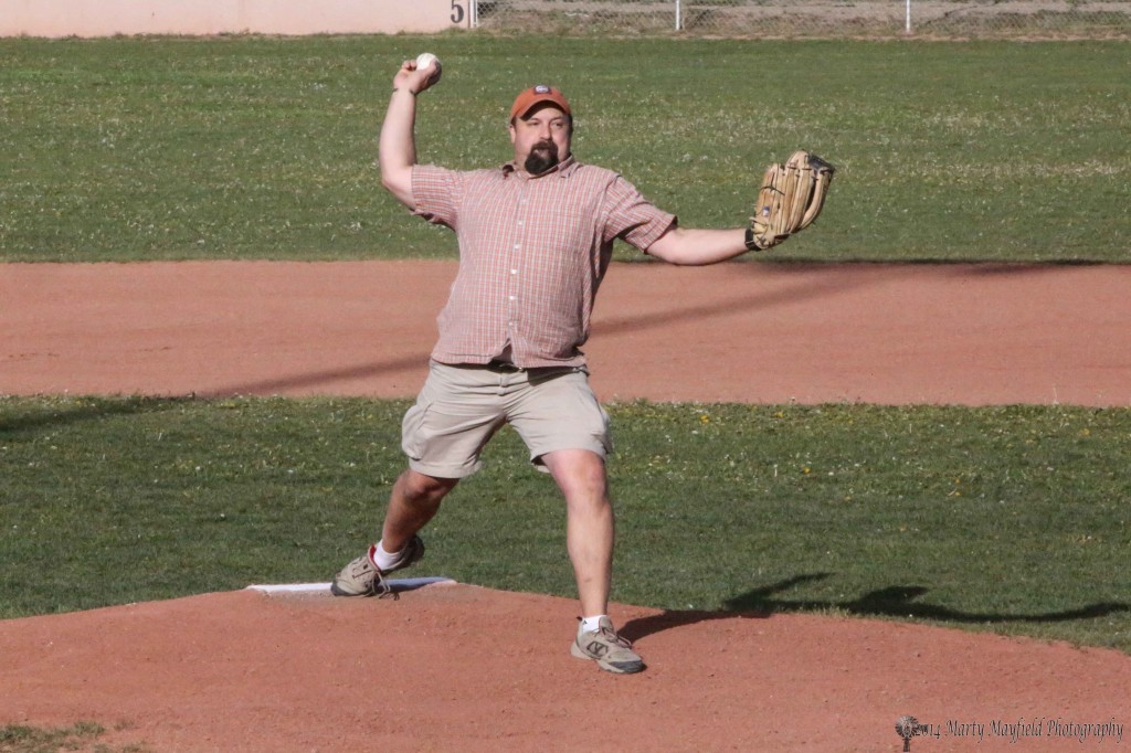 Jared Chatterly throws out the first pitch for the Osos season home opener Wednesday evening