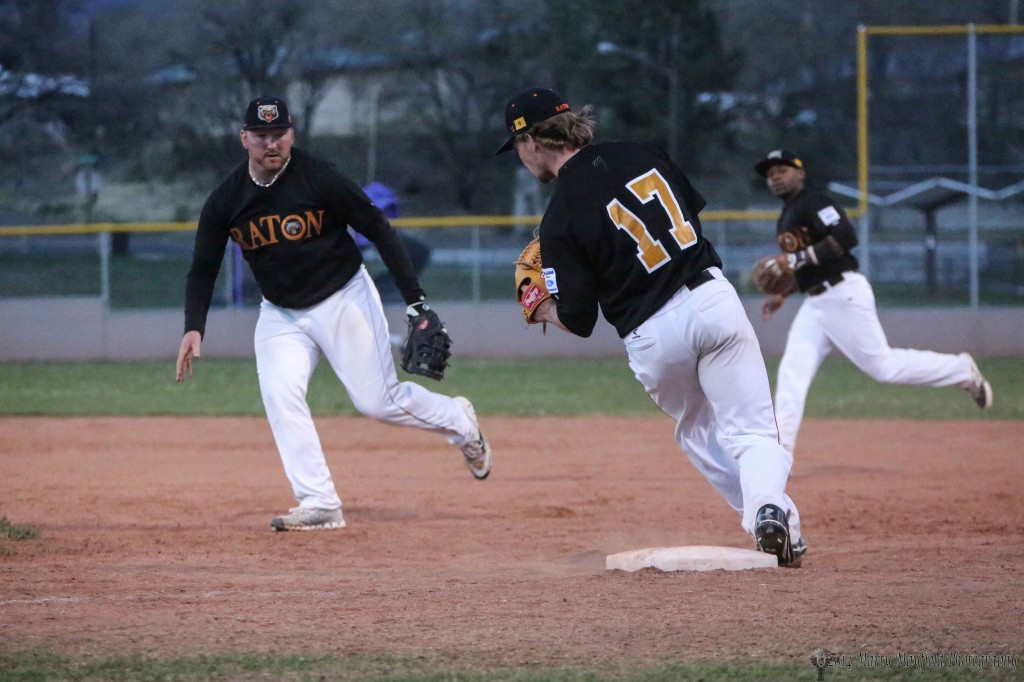 The play at first after the ball was hit to first baseman Zack Kreegar.