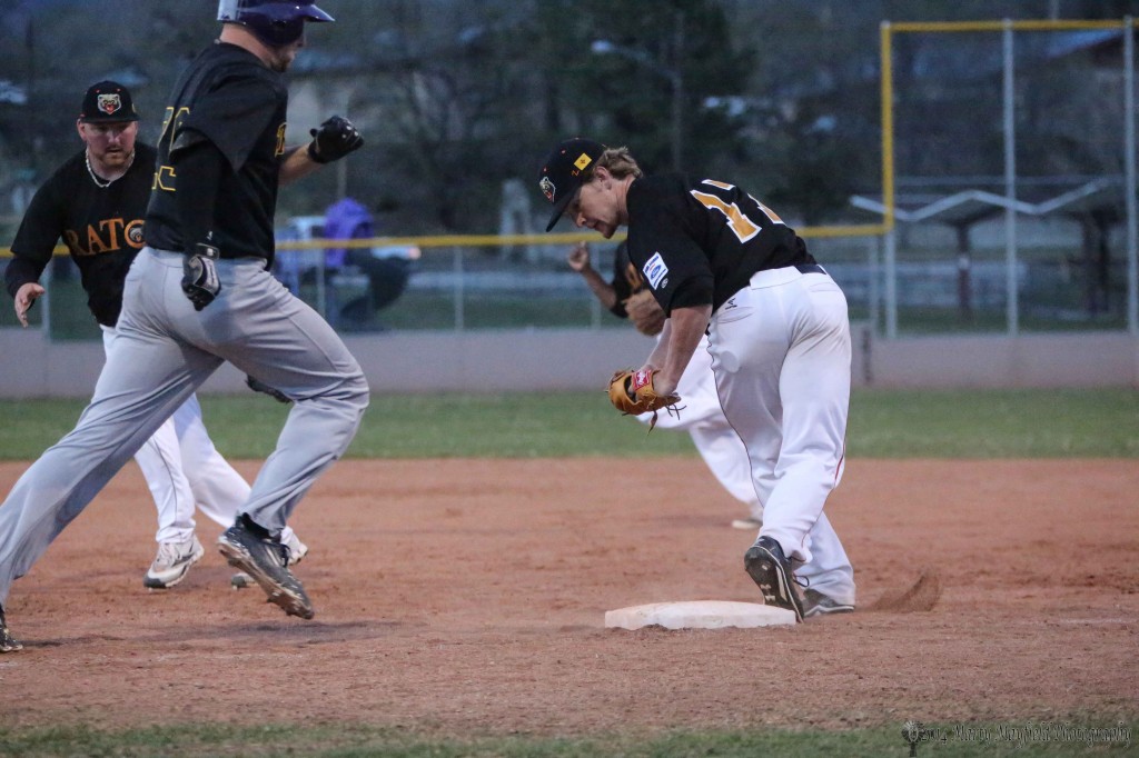 The play at first after the ball was hit to first baseman Zack Kreegar.