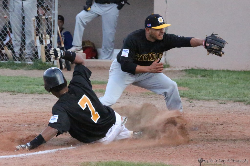 Safe at home is Luis Diaz as the ball went back to the wall on a long throw from center field.