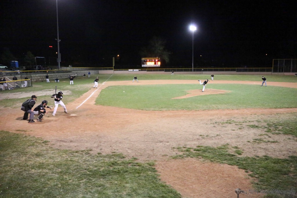 The pitch is on its way as the game nears third game of a four game series between the Osos and Triggers nears an end.