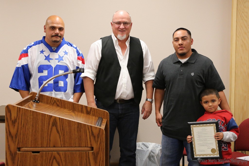 Larry Berg, Larry Marquez and Joshua Marquez accept the proclamation from Mayor Pro-Tem Neal Segotta for Public Works week. Public workers are an integral part of the community and the work they do.
