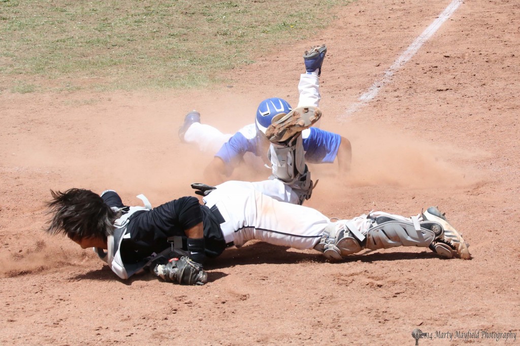Safe at Home as Darrick Stoecker stumbles and can't quite make it to the ball