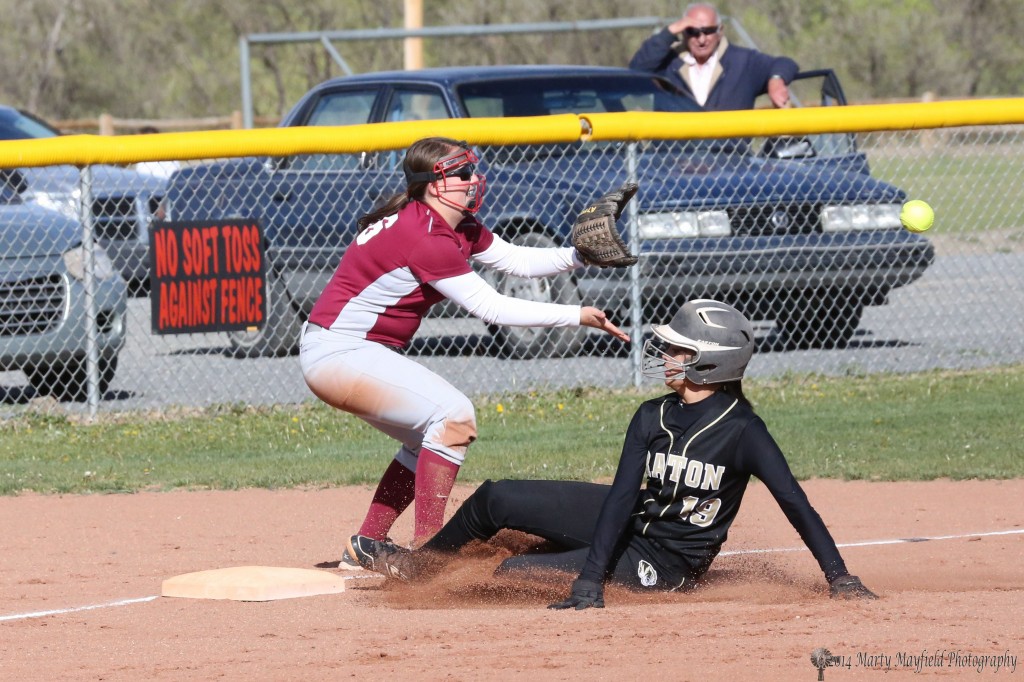 Kalista Dorrance is safe at third during the state tourney game with Sandia Prep Friday afternoon