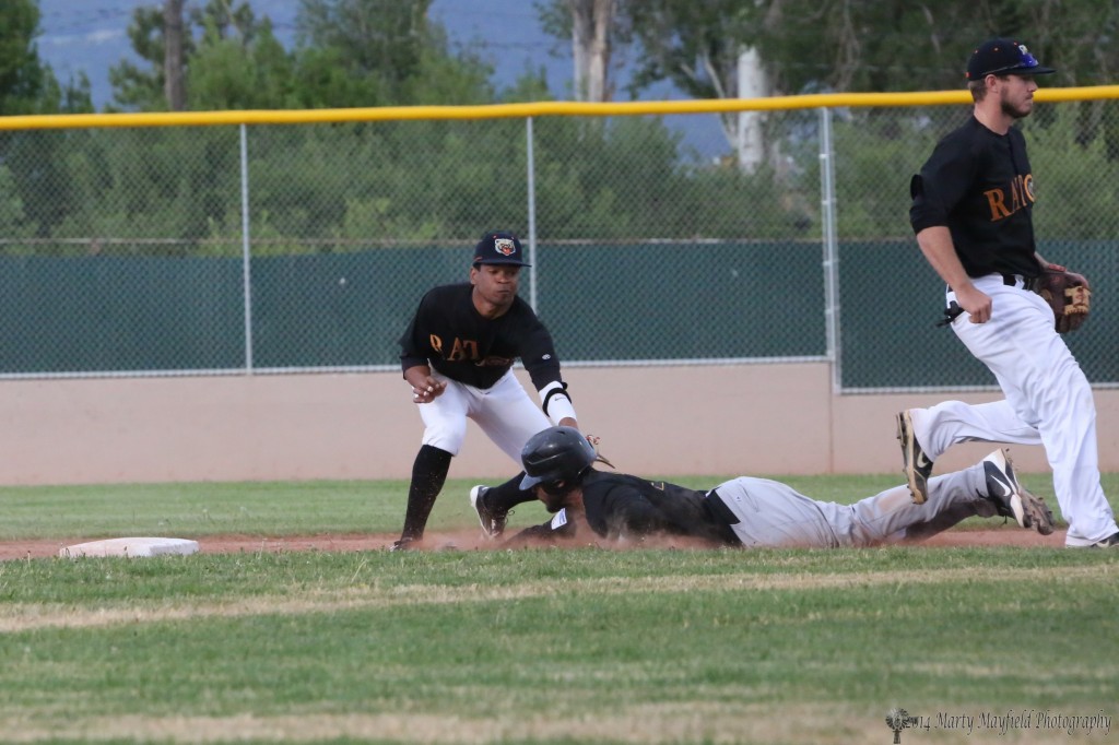 2nd Baseman Andre Oliver makes the tag on Sammy Carter well before the base Friday evening