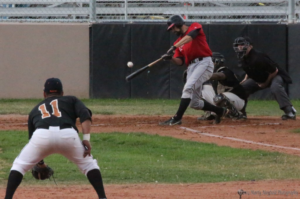 Erik Kozel connects with the ball in the first inning to move base runners 