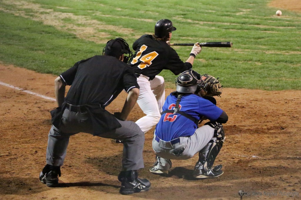Michael Campbell goes for the bunt to advance the base runners late in the game Friday evening at Gabriele Field