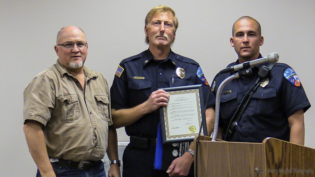 RFES Chief Jim Matthews and Captain Anthony Burke accept the proclamation from Mayor Pro-Tem Neal Segotta congratulating them for another spectacular fireworks display. The display was truly awe inspiring and thanks the to donations by Raton Residents and Lodger's Tax Funds the display was made possible. 