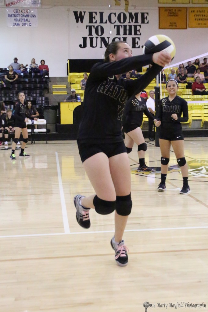 Halle Medina goes for the ball to keep it in play during the second game of the match with Espanola Valley Saturday.