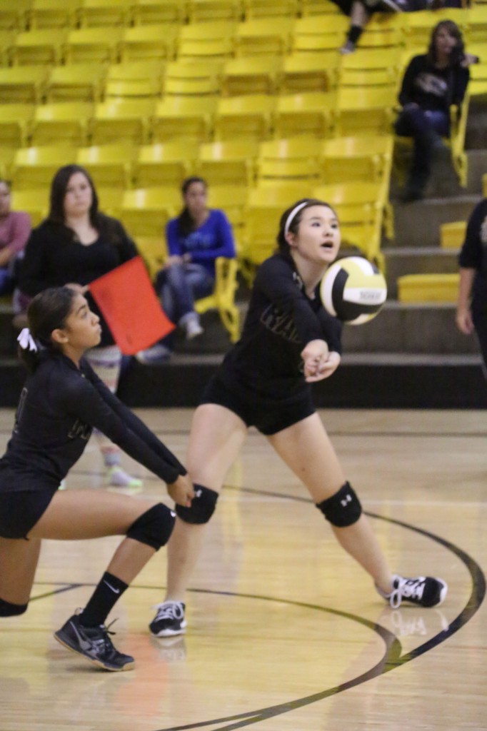 Camryn Stoeker and Autumn Archuleta move in for the ball in the JV game against La Veta Friday afternoon