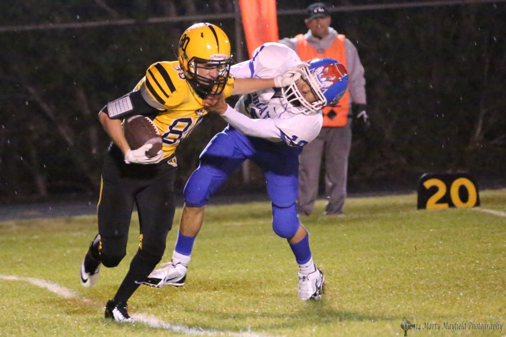 Martin Ortiz grabs a Croff pass and heads back upfield as Santiago Garcia tries to bring him down late in the game Friday night 