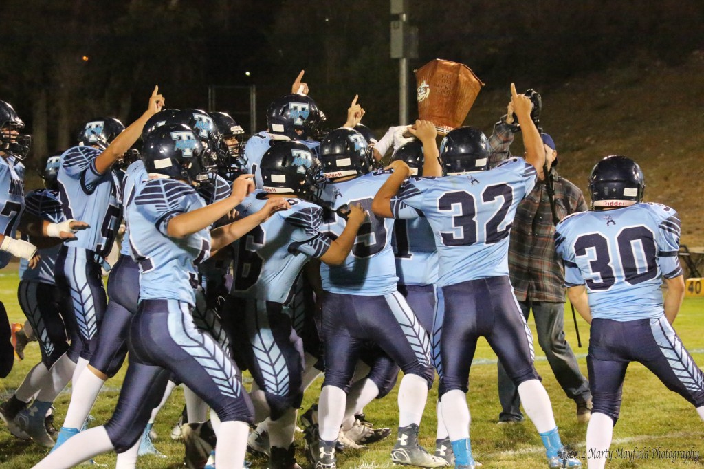 The Trinidad Miners celebrate as the Coal Bucket returns to Trinidad in this over the hill rivalry.