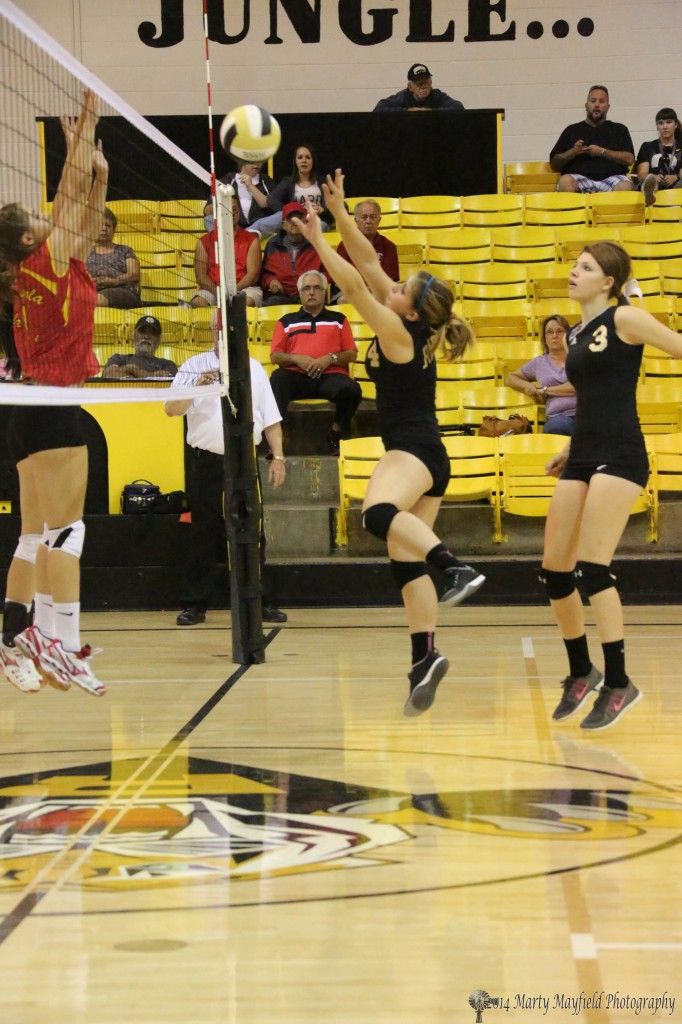 Montana Trujillo sends the ball back over the net Saturday afternoon 