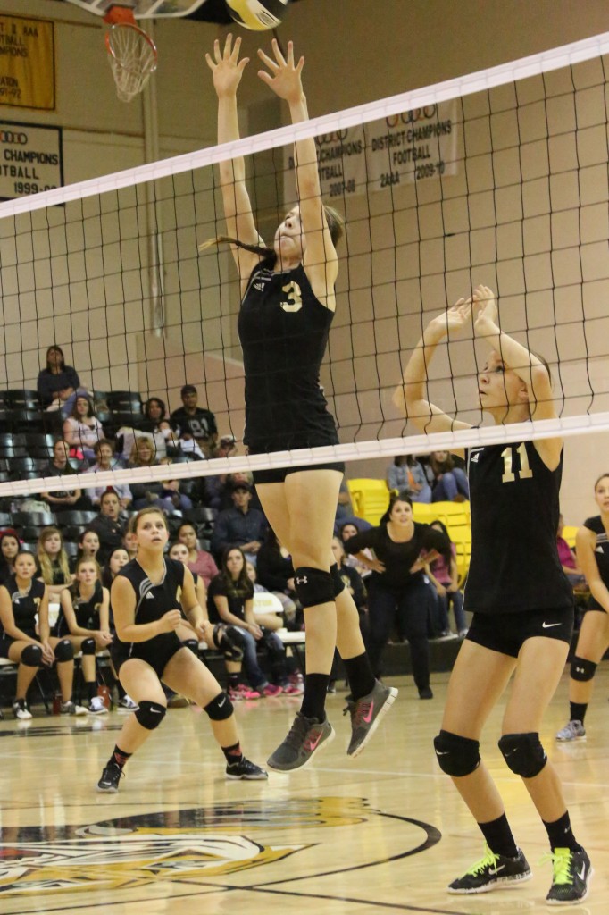 Kristina Jansen goes big for the block Friday afternoon in Tiger Gym
