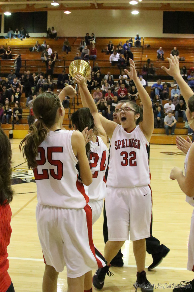 The Lady Red Devils ring the bell. Anjelica Montoya rings the bell after coming from behind to defeat the Lady Rams in the final minutes of the fourth quarter.