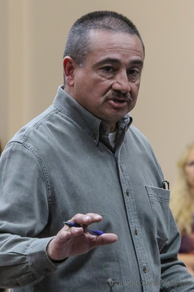 District Attorney Donald Gallegos spoke to a crowd of mostly county and city employees, law enforcement and commissioners Wednesday evening at the Colfax County Building. Only about seven of the 42 people there were regular citizens.