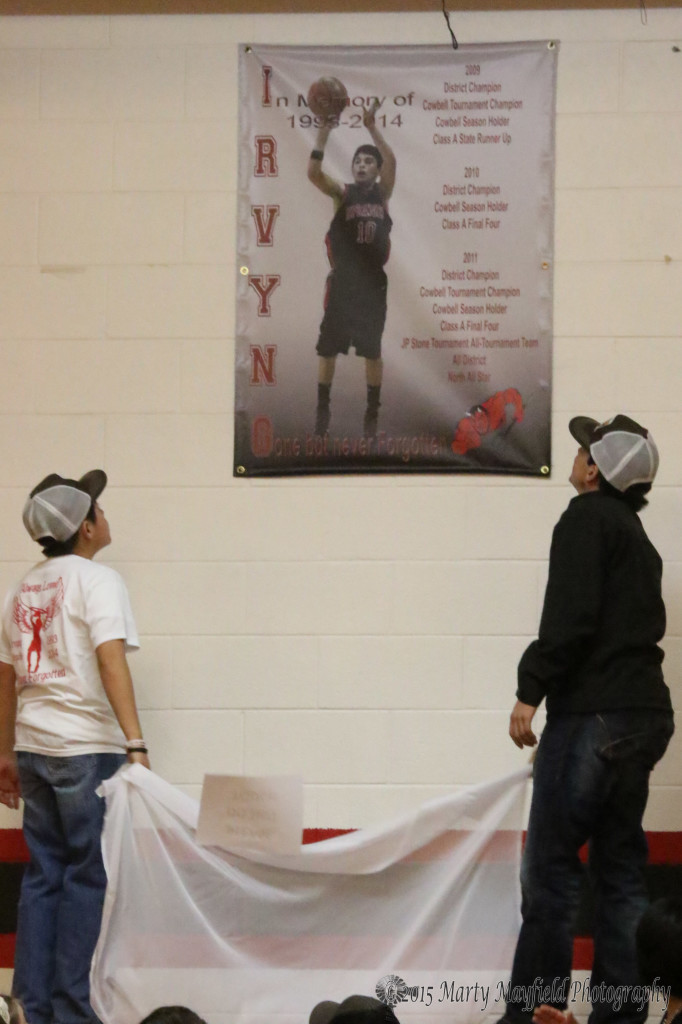 Brothers Jesus and Jose were honored with revealing the banner that now hangs in Sim Brown Gym at Springer High School