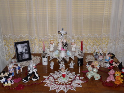 In this Valentine's Day display, examples of the following shaker forms are shown: huggers, kissers, and bench sitters.