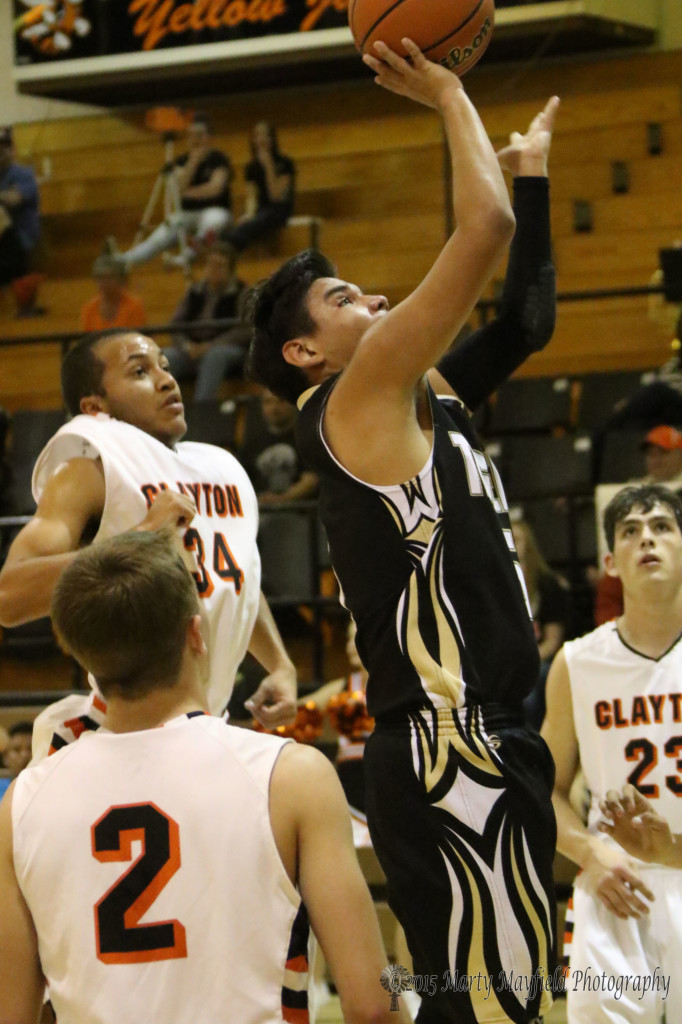 Austin Jones goes up for the shot, Austin was high point with only four points on the evening for Raton.