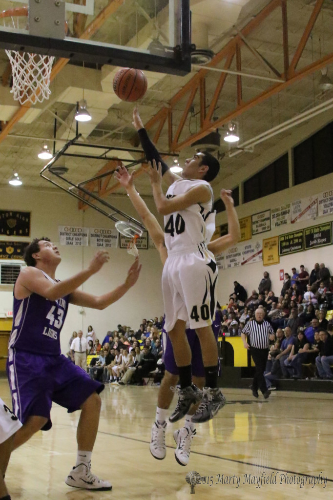 Dustin Segura slides in behind and up to the basket even with these easy shots like this one the boys just seemed they couldn't buy a basket against Santa Rosa