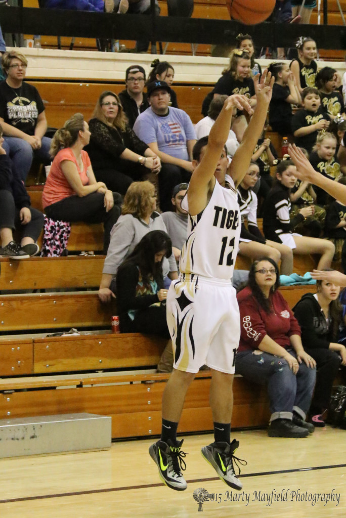 Jodus Gonzales puts one up from three point land where he put in 15 points for the Tigers