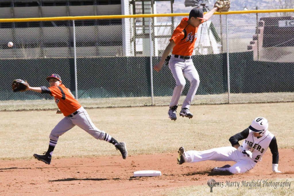 Raton's Dante Mileta steals 2nd base during game 1 of a double header with Taos for their home and season opener for Raton baseball. 