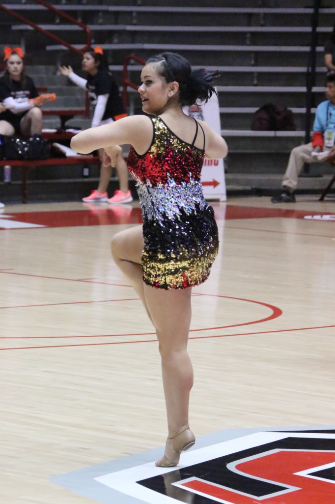 Senior Heather Segura performs in the Pit Saturday during the state spirit competition