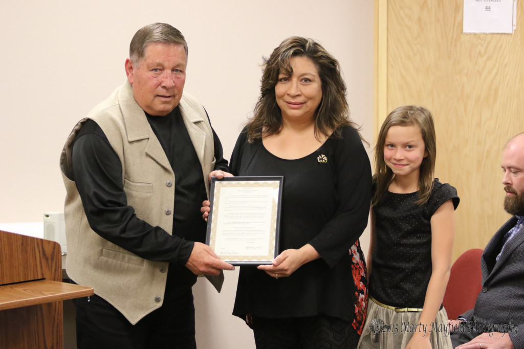 Anita Rankin and her daughter Faith Allison accept the proclamation for Child Abuse Prevention Month. The proclamation notes that child abuse and neglect are serious problems and finding a solution depends upon the involvement of the people in the community. New Mexico had over 30,000 reports of child abuse last year. 