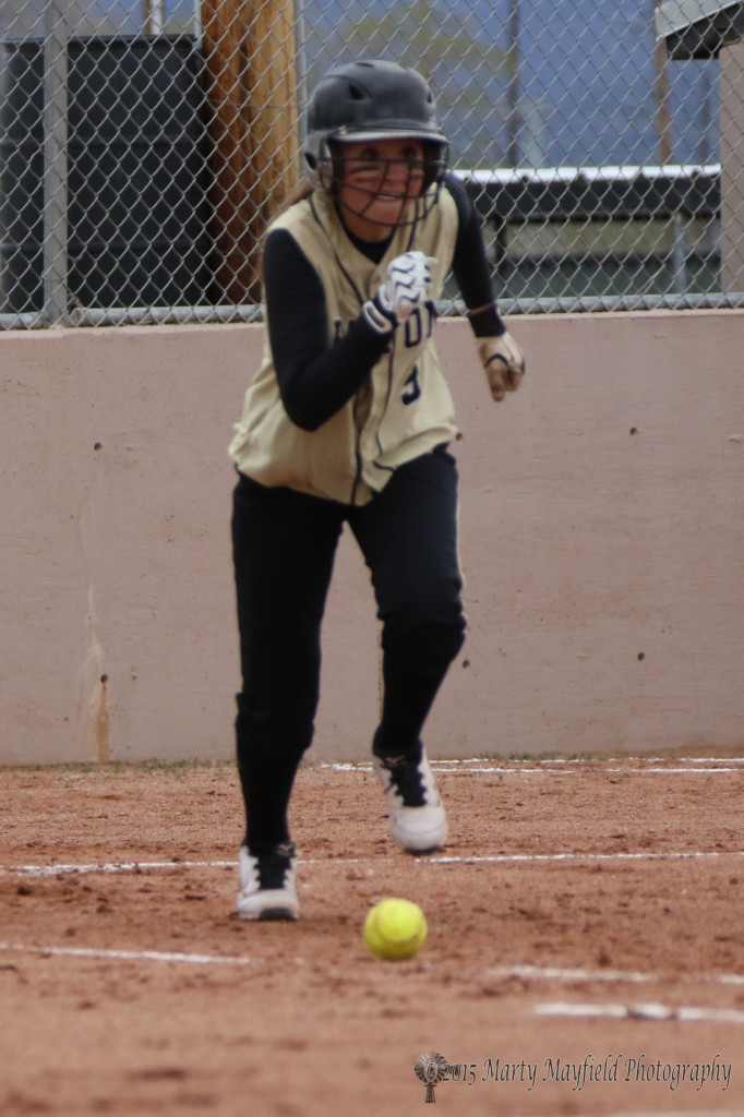 Mariah Encinias out runs a hit down the first base line Saturday afternoon against NACA Lady Eagles