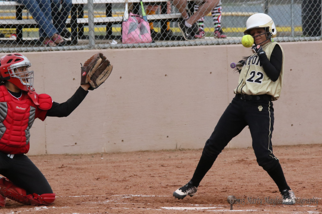 Natasha Ortega pulls back to avoid getting hit by the pitch Saturday afternoon