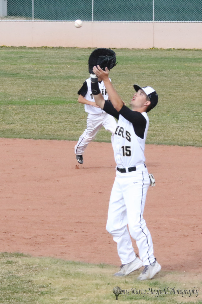 Cole Medina playing first base makes the catch on the infield fly ball.