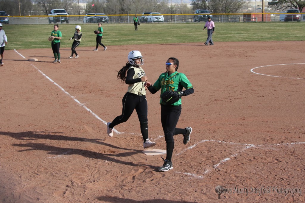 Sophia Maddaleni crosses home plate to end the game against Pecos Tuesday afternoon. 