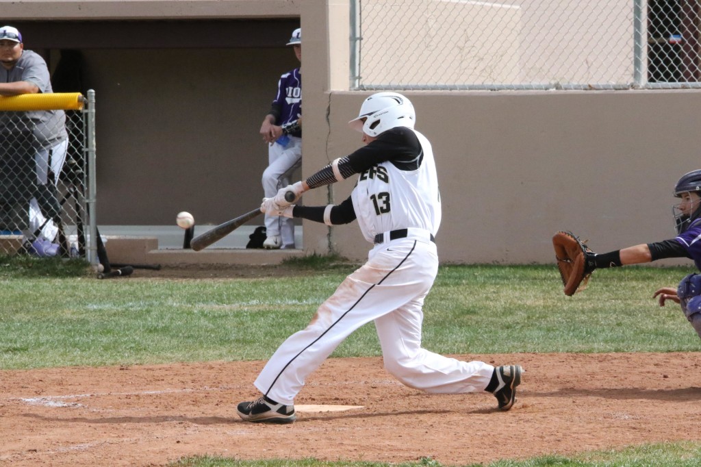 Another Senior Martin Ortiz makes contact with the ball to bring in another two runs Saturday afternoon in game two.