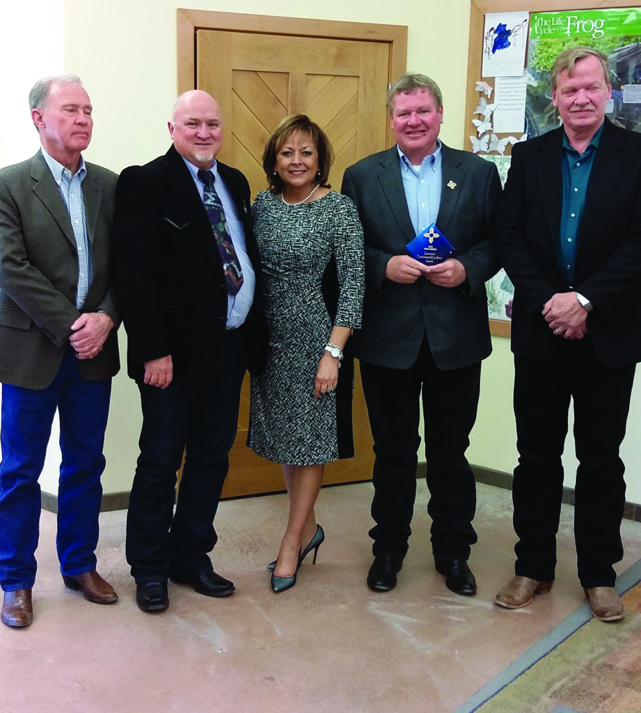 Pictured above:  Al Litchfield (Chairman – Raton Water Board), Neil Segotta (Mayor Pro Tem currently, Mayor during the Track Fire), New Mexico Governor Susana Martinez, Scott Berry (Raton City Manager), Dan Campbell (General Manager of Raton Water Works).  Gus Holm (Ranch Manager - Vermejo Park Ranch) was also present to accept an award for wildlife conservation.  Photo courtesy Scott Berry. 