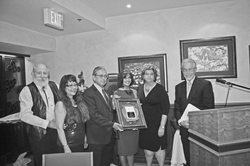 left to right: John Schecter, President, and Linda Barron, President Elect, Trinidad Chamber of Commerce; Ed Griego, Kathleen Griego and Karen Griego, 2015 Chenowith honorees; and Tom Perry, 2012 Chenowith honoree. Photo by Mary Jo Tesitor.