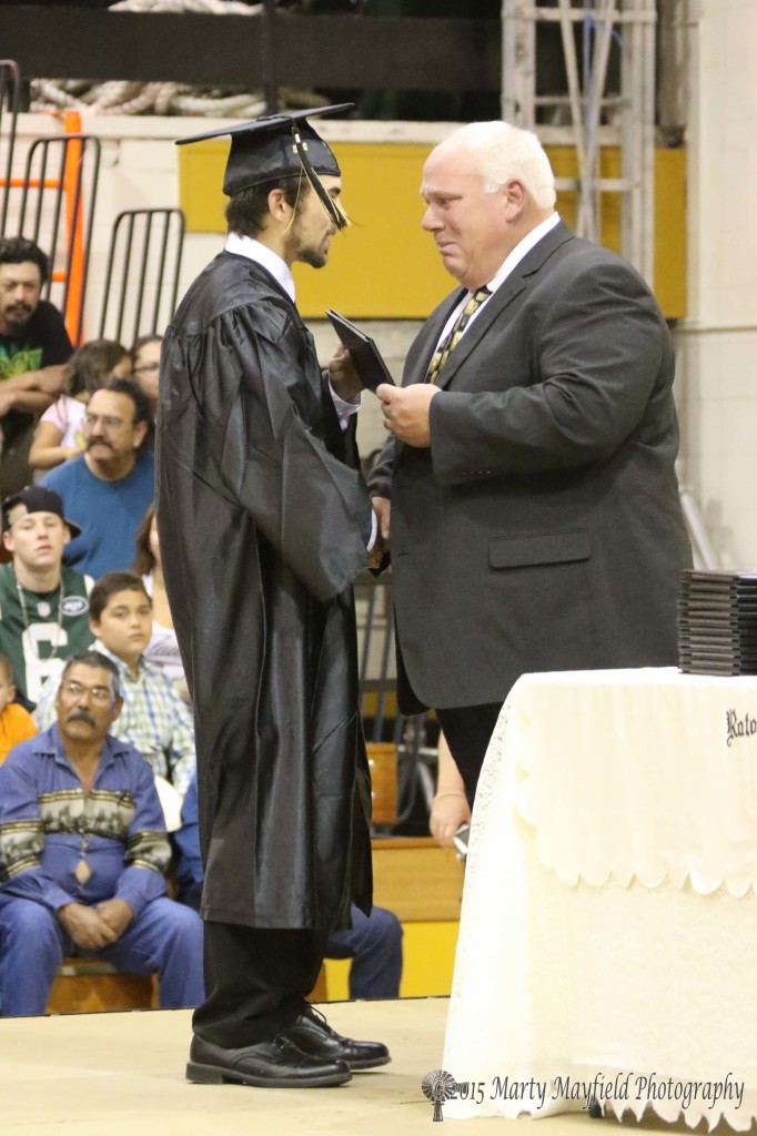 RHS Principal Duncan Ware presented his eldest Connell Ware his diploma Friday evening. 