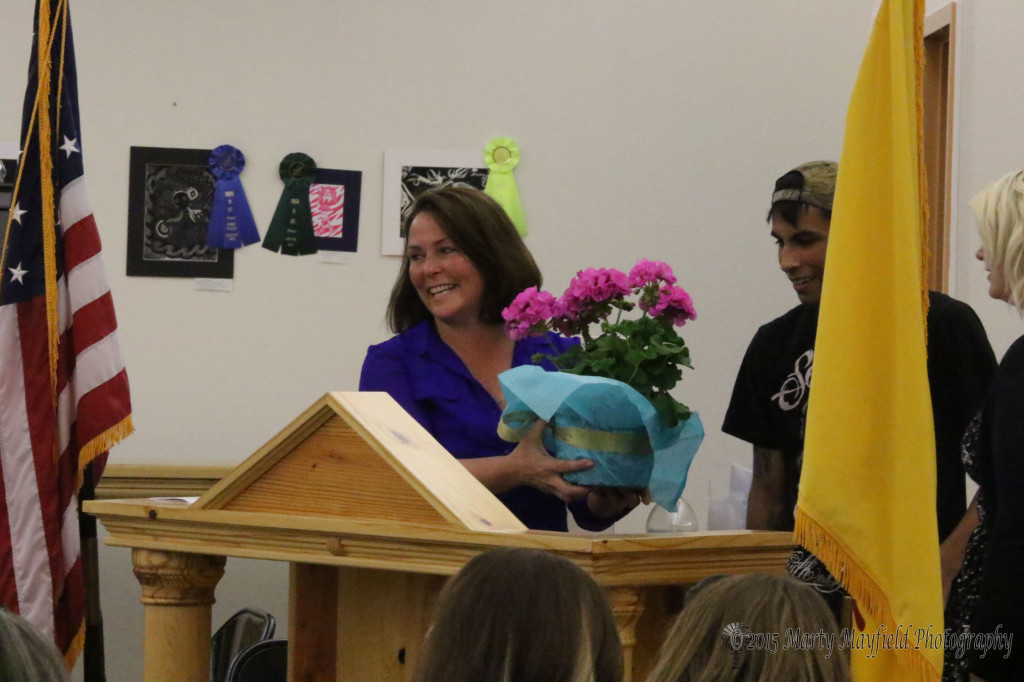 Raton High art club members presented Kathy Vertovkc with flowers as she will be retiring this year. 