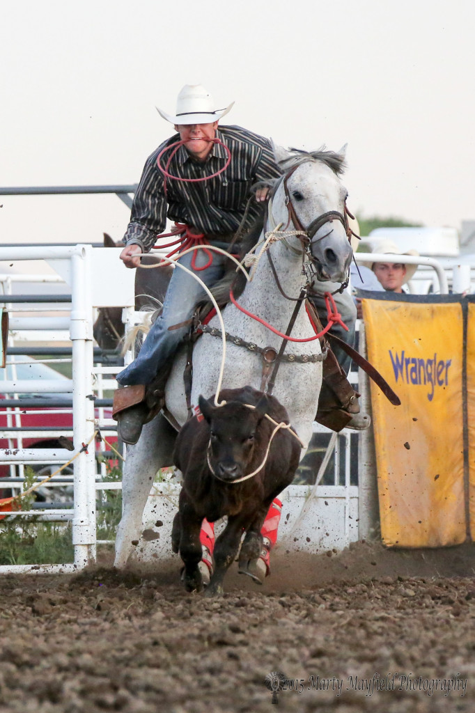 Conner Hall takes a 8.2 second run during the Tie Down roping at the 37th annual Raton Rodeo