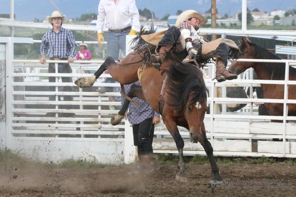 Codi Myers the only Bareback Rider posted a 70 as he hangs on to this bronc at the Saturday evening performance of the 37th Annual Raton Rodeo