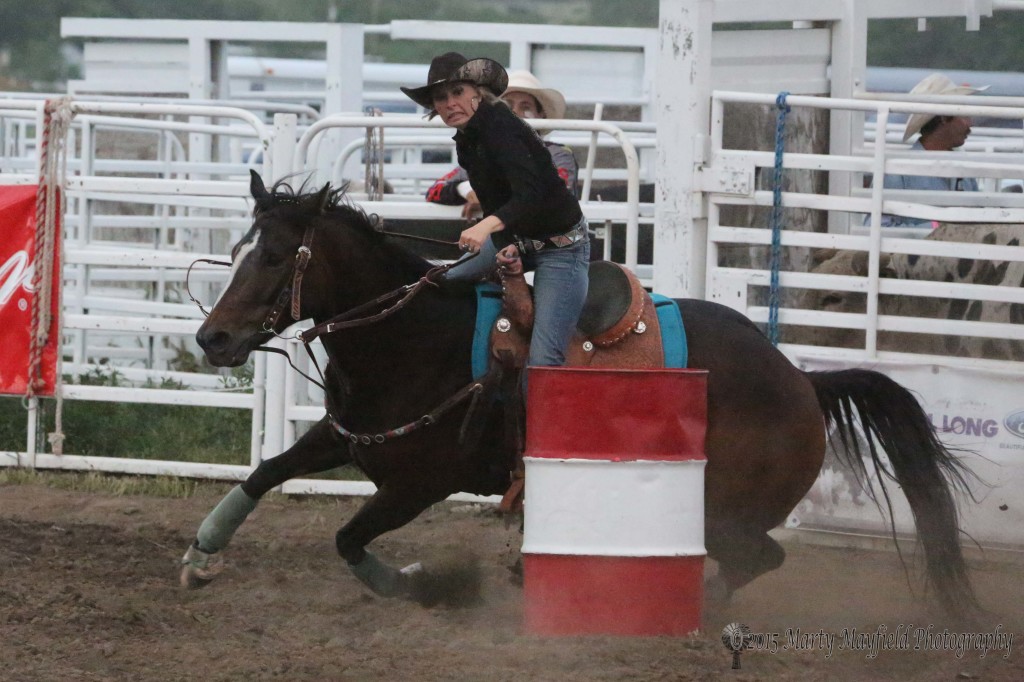 DiAnna Erdely rounds her second barrel and heads for number three on her way to a 17.68 second run Saturday evening